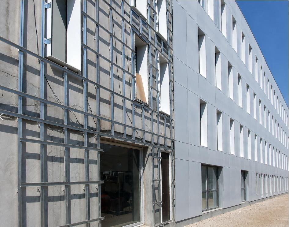 Rainscreen substructure under construction, showing the ventilated cavity behind the cladding